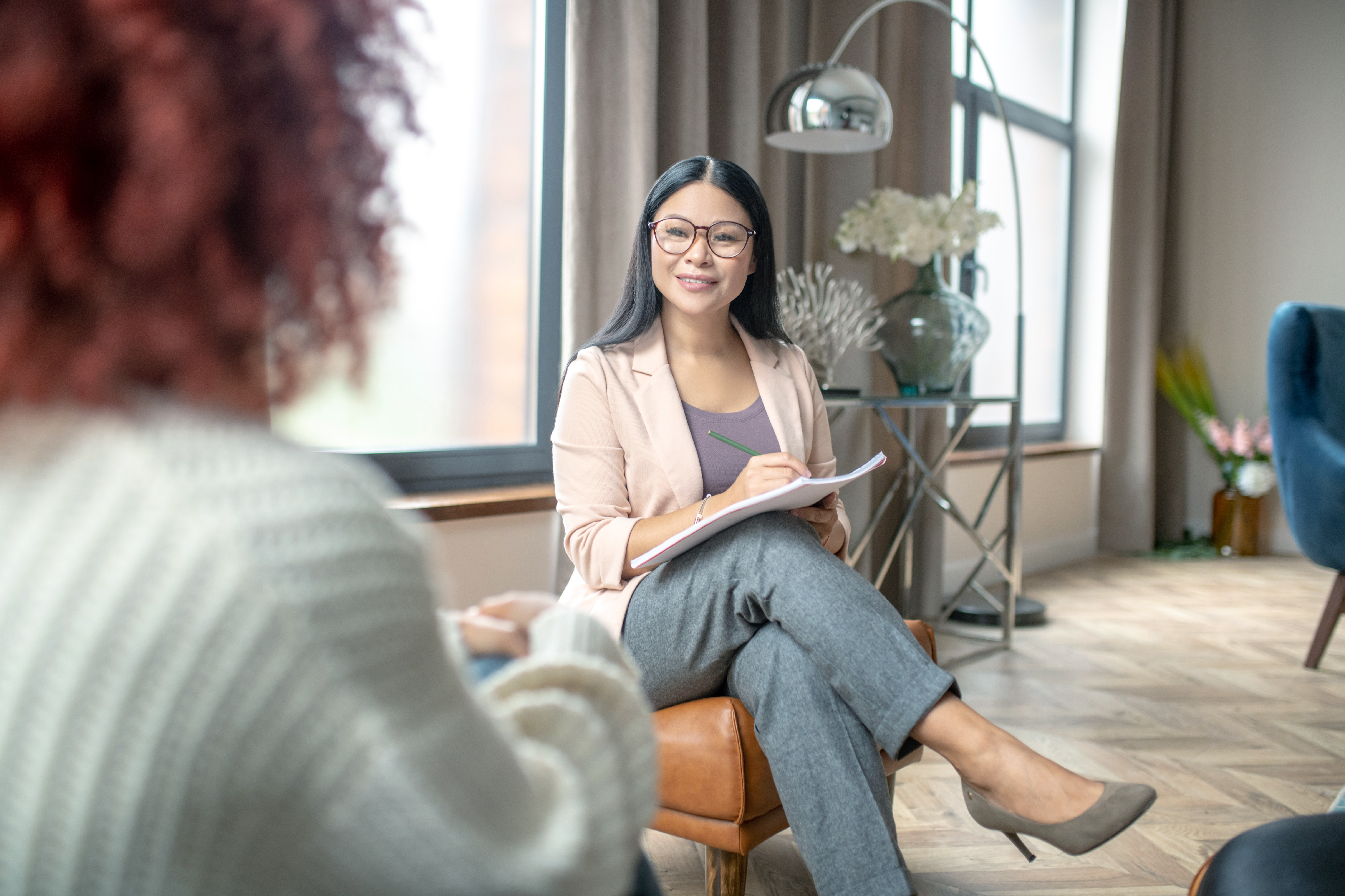 Woman speaking to therapist about living with anxiety